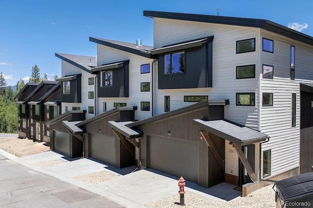 387 Bear Trl, Winter Park, CO 80482 - view of front facade with concrete driveway