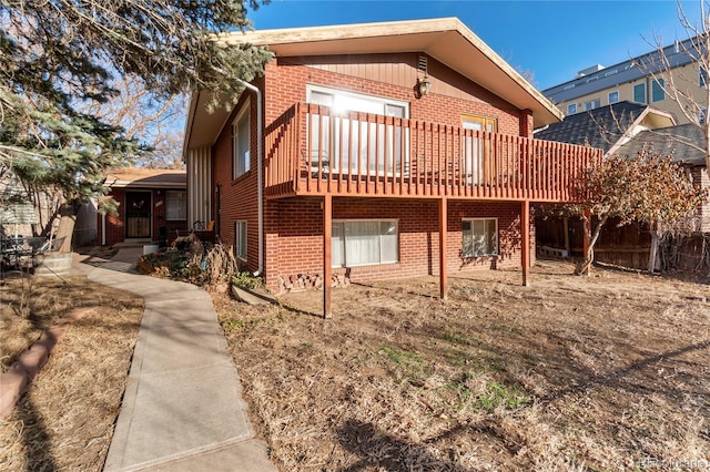 exterior space with brick siding