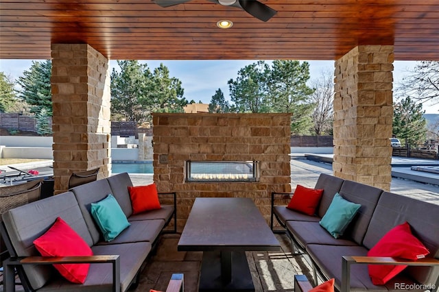 15902 W 64th Ave, Arvada, CO 80007 - view of patio / terrace featuring outdoor lounge area, a ceiling fan, and fence