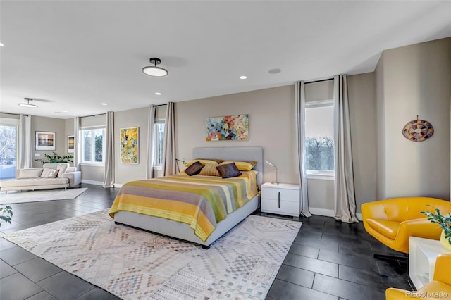 15902 W 64th Ave, Arvada, CO 80007 - bedroom with recessed lighting, baseboards, and dark tile patterned flooring