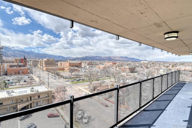 balcony featuring a mountain view