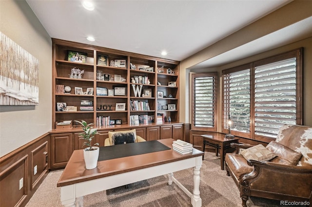 office featuring wainscoting, a decorative wall, light colored carpet, and recessed lighting