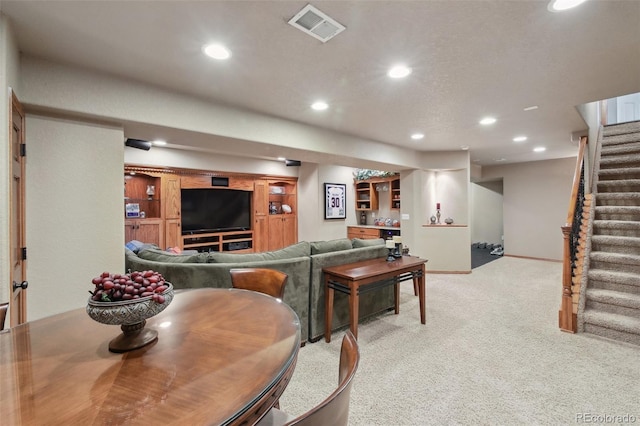 14417 W 57th Pl, Arvada, CO 80002 - carpeted living room featuring recessed lighting, stairway, and baseboards