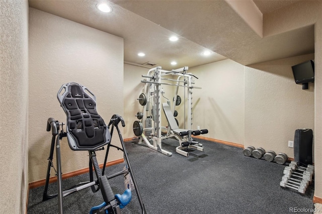 14417 W 57th Pl, Arvada, CO 80002 - workout area with recessed lighting, a textured wall, and baseboards