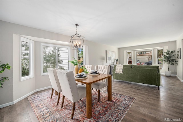 17548 E Wesley Pl, Aurora, CO 80013 - dining area with a chandelier and wood finished floors