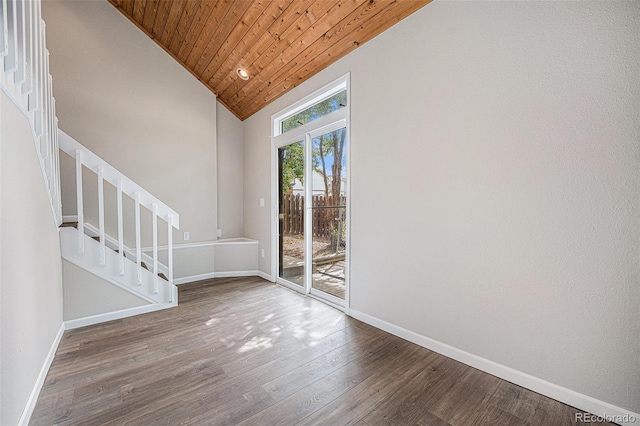 17548 E Wesley Pl, Aurora, CO 80013 - entrance foyer featuring wood ceiling, stairway, high vaulted ceiling, and wood finished floors