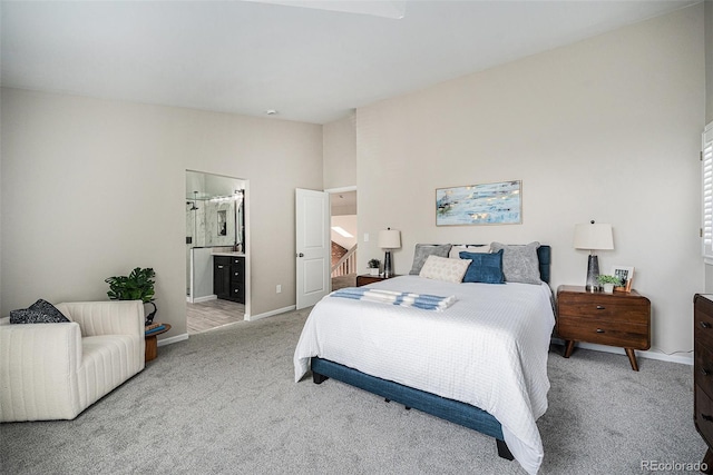 17548 E Wesley Pl, Aurora, CO 80013 - bedroom with light carpet and ensuite bathroom