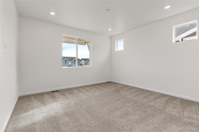 9314 Quartz St, Arvada, CO 80007 - unfurnished room with carpet, baseboards, and recessed lighting