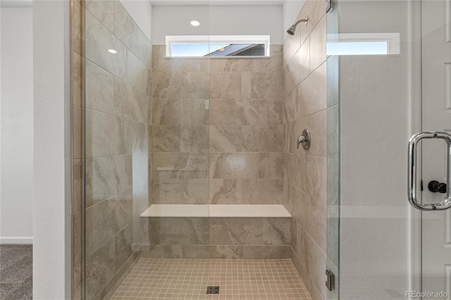 9314 Quartz St, Arvada, CO 80007 - full bath featuring a shower stall and healthy amount of natural light