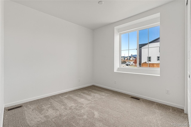 9314 Quartz St, Arvada, CO 80007 - empty room featuring carpet flooring and baseboards