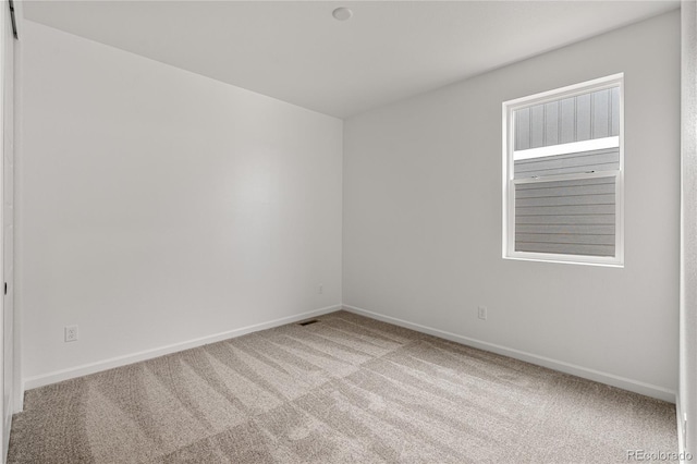 9314 Quartz St, Arvada, CO 80007 - carpeted spare room with baseboards
