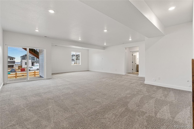 9314 Quartz St, Arvada, CO 80007 - spare room featuring recessed lighting, carpet, and baseboards