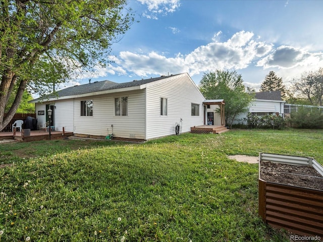 6801 W 52nd Ave, Arvada, CO 80002 - back of property featuring a deck
