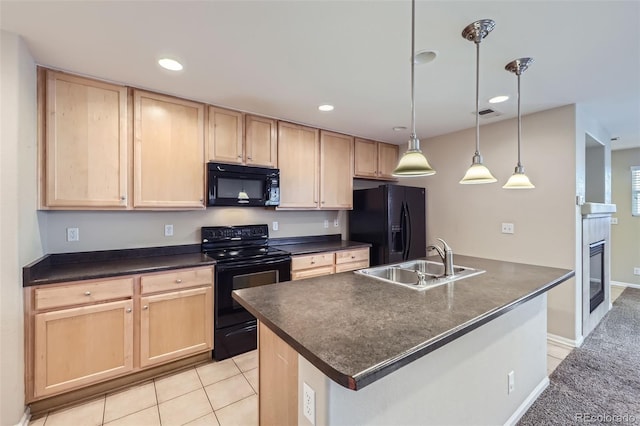 kitchen with black appliances, hanging light fixtures, light tile patterned flooring, sink, and light brown cabinets