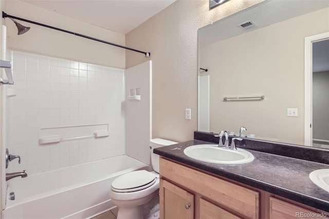 full bathroom featuring toilet, shower / tub combination, and vanity