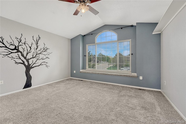 3630 Sawgrass Trl, Castle Rock, CO 80109 - carpeted spare room with a ceiling fan, vaulted ceiling, and baseboards