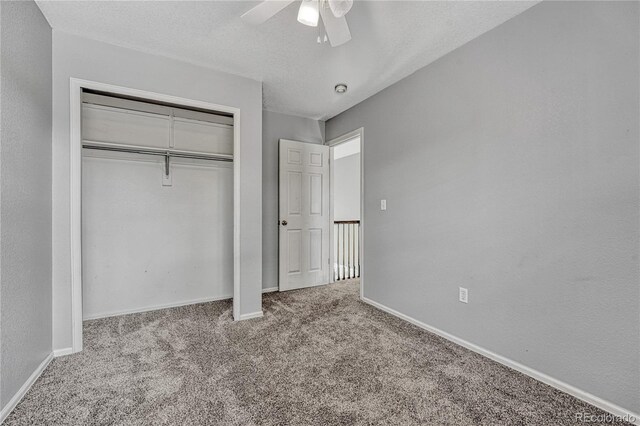 3630 Sawgrass Trl, Castle Rock, CO 80109 - unfurnished bedroom featuring carpet floors, baseboards, a closet, and a ceiling fan