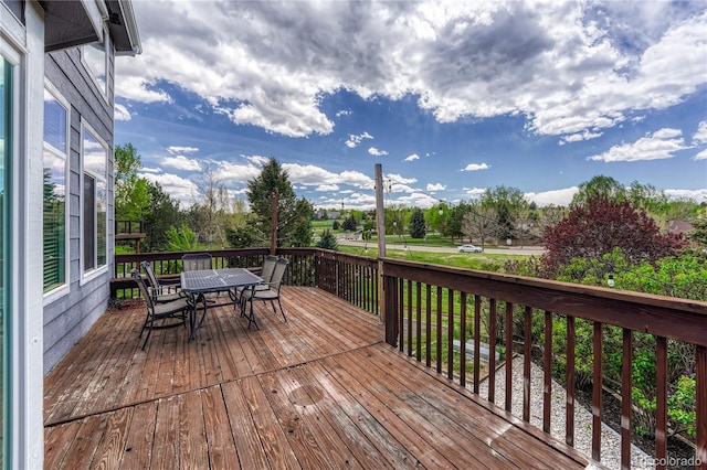 3630 Sawgrass Trl, Castle Rock, CO 80109 - wooden terrace with outdoor dining space