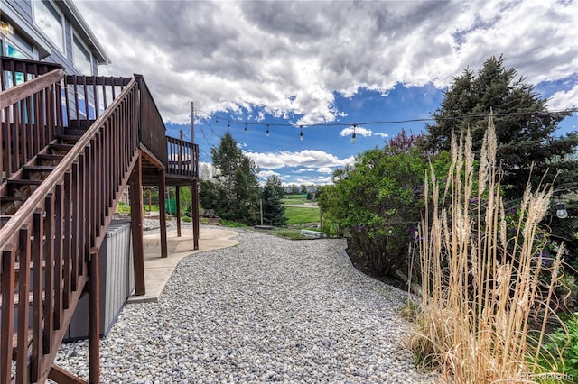 3630 Sawgrass Trl, Castle Rock, CO 80109 - view of yard featuring a patio, a deck, and stairs
