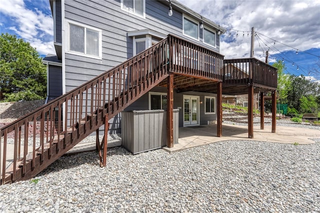 3630 Sawgrass Trl, Castle Rock, CO 80109 - rear view of property featuring stairway, a deck, and a patio area