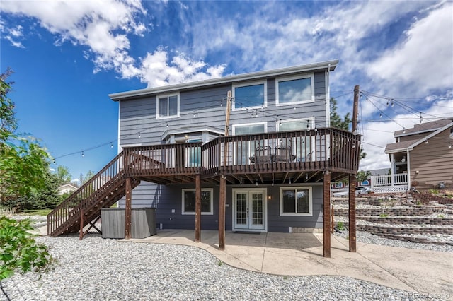 3630 Sawgrass Trl, Castle Rock, CO 80109 - rear view of house featuring french doors, a wooden deck, a patio, and stairs