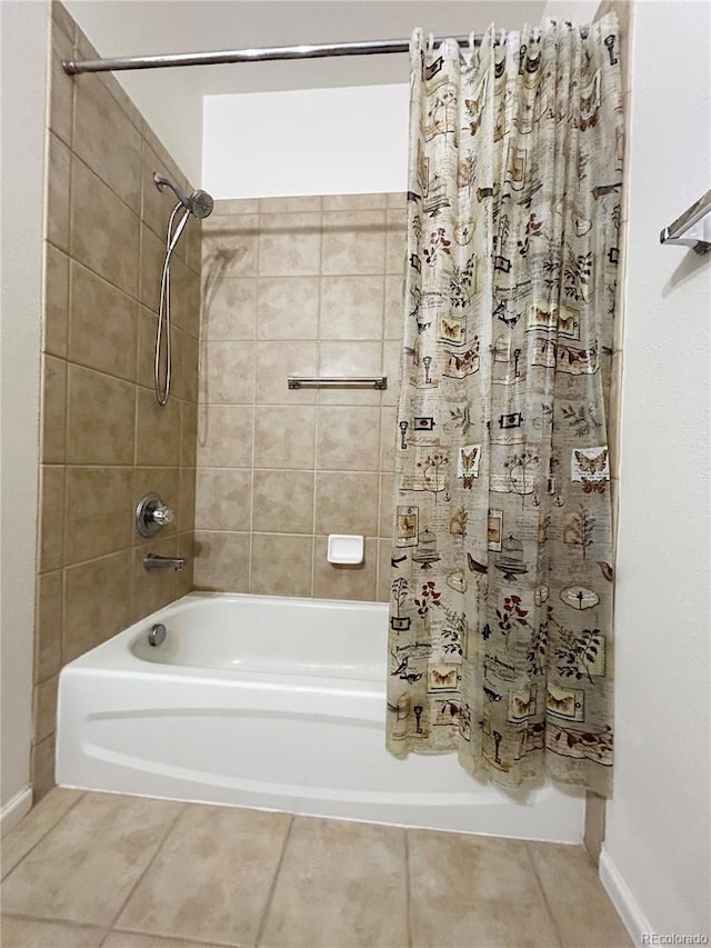 bathroom featuring tile patterned flooring and shower / bathtub combination with curtain