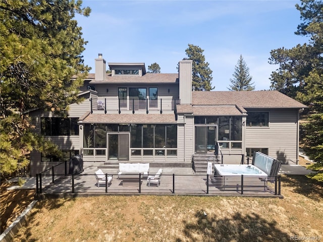 31607 Broadmoor Dr, Evergreen, CO 80439 - back of house with a balcony, a sunroom, a chimney, a patio area, and roof with shingles