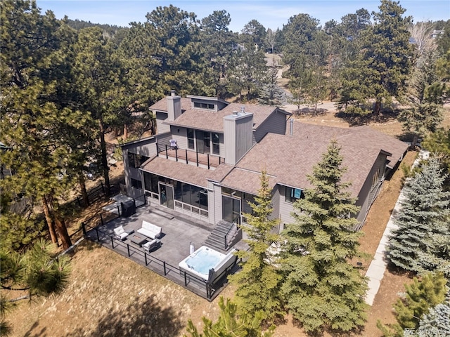 31607 Broadmoor Dr, Evergreen, CO 80439 - aerial view of property and surrounding area with a pool area
