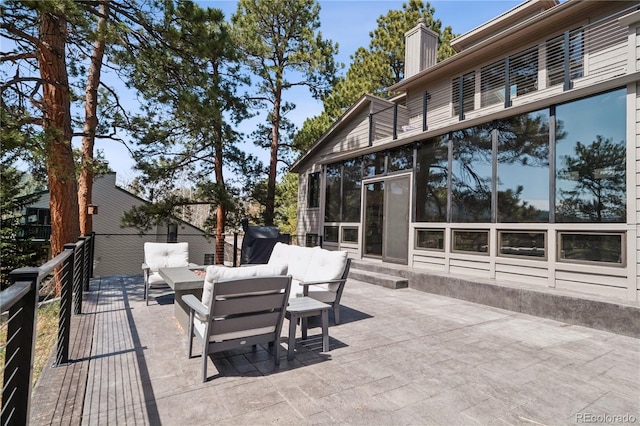 31607 Broadmoor Dr, Evergreen, CO 80439 - view of patio featuring entry steps and a sunroom