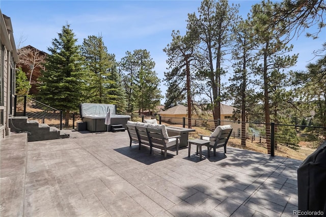 31607 Broadmoor Dr, Evergreen, CO 80439 - view of patio / terrace featuring a hot tub and an outdoor living space