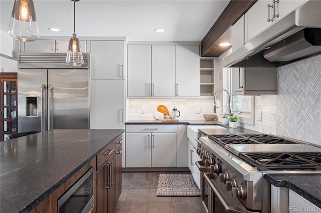31607 Broadmoor Dr, Evergreen, CO 80439 - kitchen featuring stainless steel appliances, under cabinet range hood, open shelves, white cabinetry, and a sink