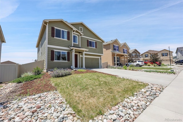 10684 Calista Way, Fountain, CO 80817 - traditional home featuring an attached garage, a residential view, and concrete driveway