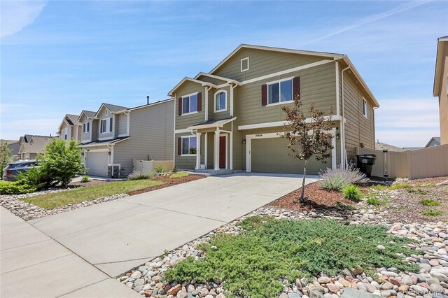 10684 Calista Way, Fountain, CO 80817 - traditional-style house with an attached garage, driveway, and a residential view