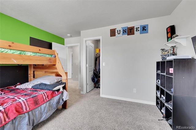 10684 Calista Way, Fountain, CO 80817 - bedroom featuring carpet flooring and a walk in closet