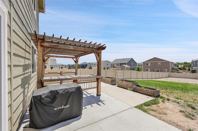 10684 Calista Way, Fountain, CO 80817 - fenced backyard featuring a residential view, a vegetable garden, grilling area, a patio, and a pergola