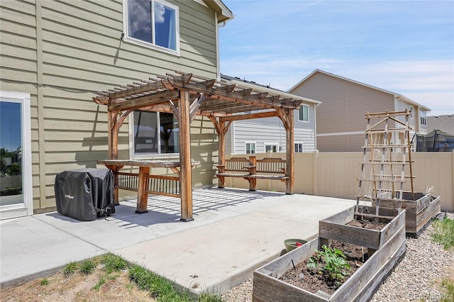 10684 Calista Way, Fountain, CO 80817 - view of patio with a vegetable garden, a grill, and a pergola