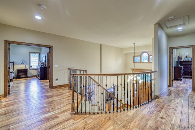 corridor featuring hardwood / wood-style floors