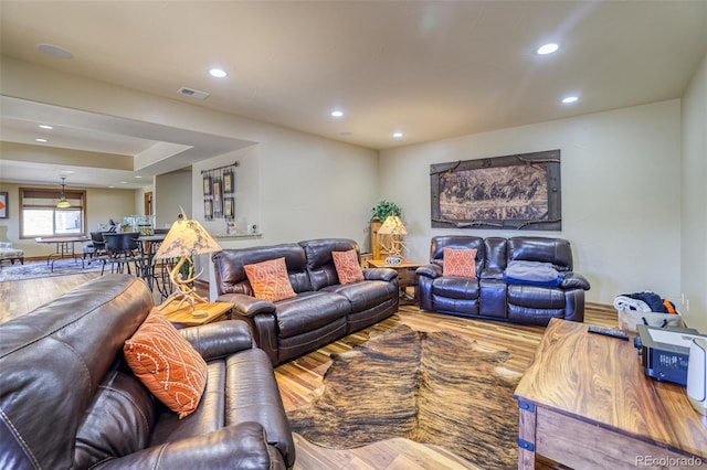 living room with wood-type flooring