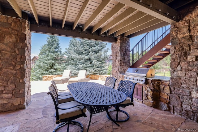 view of patio / terrace featuring area for grilling and exterior kitchen