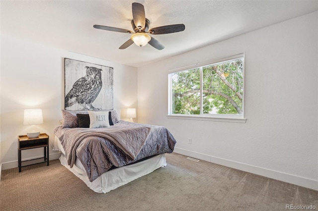 18355 W 59th Dr, Golden, CO 80403 - carpeted bedroom with baseboards and ceiling fan