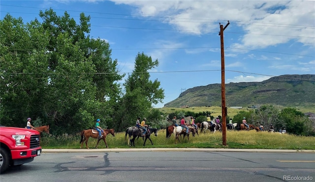 18355 W 59th Dr, Golden, CO 80403 - view of asphalt street with a mountain view and curbs