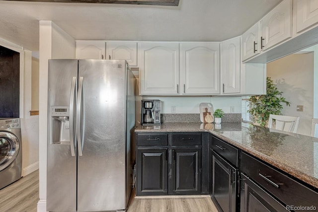 1572 W Long Ave, Littleton, CO 80120 - kitchen featuring stainless steel fridge with ice dispenser, washer / dryer, light wood finished floors, white cabinetry, and light stone countertops