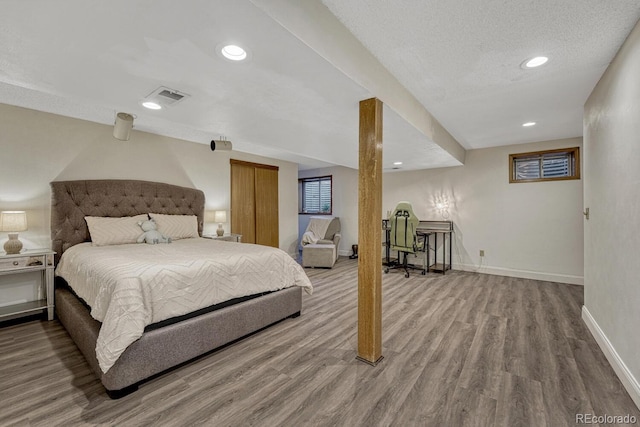 1572 W Long Ave, Littleton, CO 80120 - bedroom featuring wood finished floors and recessed lighting