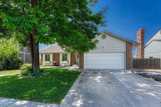 1572 W Long Ave, Littleton, CO 80120 - ranch-style house featuring brick siding, an attached garage, and driveway