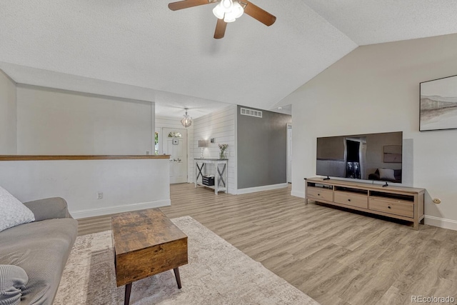 1572 W Long Ave, Littleton, CO 80120 - living area featuring wood finished floors, ceiling fan, and high vaulted ceiling