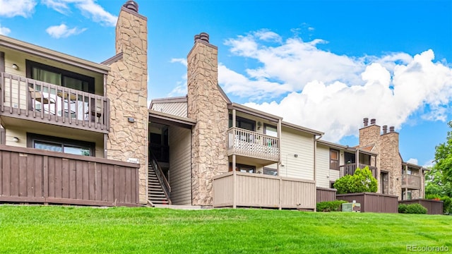 7750 W 87th Dr Unit C, Arvada, CO 80005 - view of property featuring stairway
