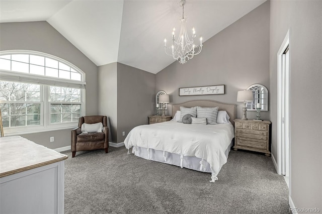 carpeted bedroom featuring a notable chandelier, baseboards, and lofted ceiling