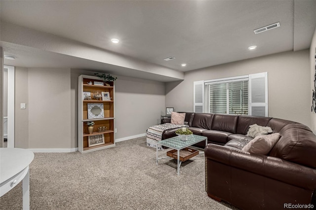 carpeted living room featuring visible vents, recessed lighting, and baseboards