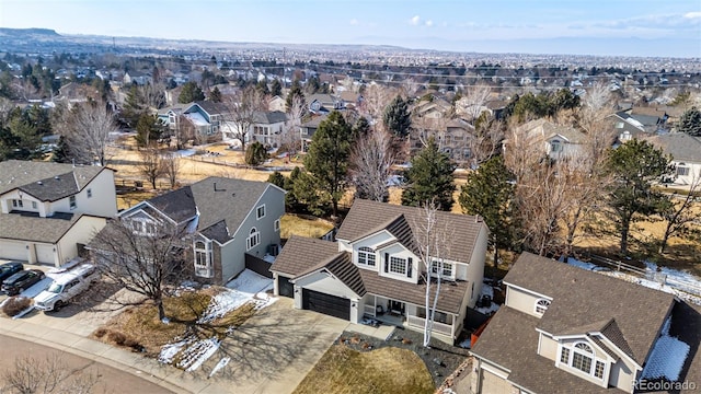 birds eye view of property with a residential view