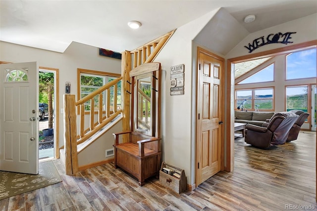 116 County Road 414, Granby, CO 80446 - foyer entrance with wood finished floors, stairway, and lofted ceiling